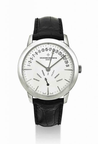 VACHERON CONSTANTIN. AN 18K WHITE GOLD AUTOMATIC BI-RETROGRADE WRISTWATCH WITH DAY AND DATE