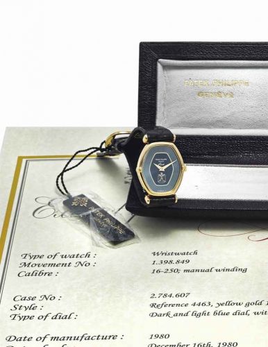 PATEK PHILIPPE. A RARE 18K GOLD WRISTWATCH WITH IRQAI COAT OF ARMS