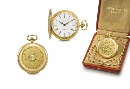 Patek Philippe. A very fine and rare 18K gold limited edition hunter case keyless lever watch with gold relief by Hans Erni, chain and original box, made for the 50th target shooting contest in Lucerne in 1979