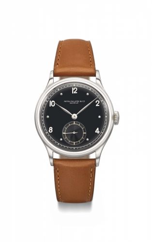 Patek Philippe. A very fine and extremely rare “Staybrite” stainless steel wristwatch with black dial