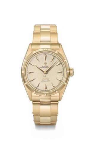 Rolex. A fine, very rare and highly attractive 18K pink gold automatic wristwatch with sweep centre seconds, honeycomb luminous dial and bracelet