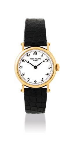 PATEK PHILIPPE. A LADY'S 18K GOLD WRISTWATCH WITH BREGUET NUMERALS, ORIGINAL CERTIFICATE AND BOX