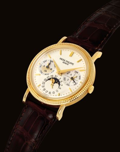 PATEK PHILIPPE. A FINE 18K GOLD AUTOMATIC PERPETUAL CALENDAR WRISTWATCH WITH MOON PHASES, 24 HOUR, LEAP YEAR INDICATION, ORIGINAL CERTIFICATE AND BOX