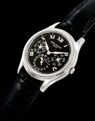 PATEK PHILIPPE. A FINE AND RARE 18K WHITE GOLD LIMITED EDITION AUTOMATIC PERPETUAL CALENDAR WRISTWATCH WITH MOON PHASES, LEAP YEAR/bb,/bb 24 HOUR INDICATION, ORIGINAL CERTIFICATE AND BOX
