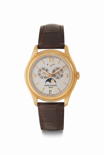 Patek Philippe. A Rare 18k Pink Gold Limited Edition Automatic Annual Calendar Wristwatch with Power Reserve and Moon Phases