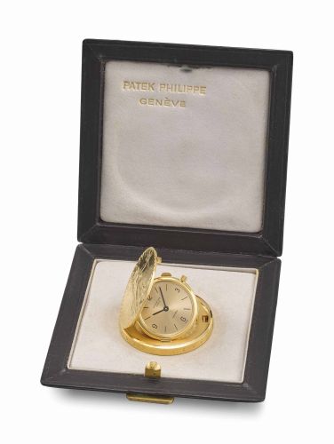 Patek Philippe. A fine and rare 18K gold United States of America Twenty Dollars Coin watch with satiné gilt dial and box