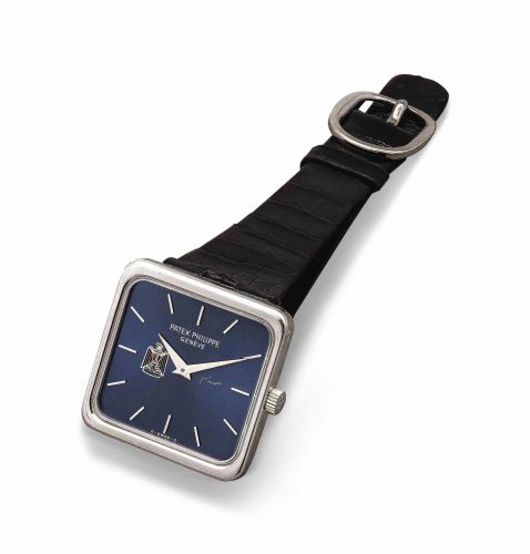 PATEK PHILIPPE. A RARE AND VERY FINE 18K WHITE GOLD SQUARE WRISTWATCH WITH IRAQI COAT OF ARMS, CERTIFICATE AND PERIOD BOX