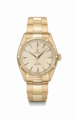 Rolex. A fine, very rare and highly attractive 18K pink gold automatic wristwatch with sweep centre seconds, honeycomb luminous dial and bracelet