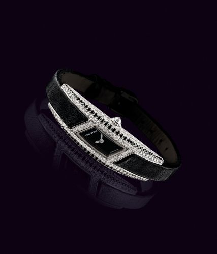 CARTIER. A LADY'S FINE 18K WHITE GOLD, BLACK DIAMOND AND DIAMOND-SET PARALLELOGRAM-SHAPED WRISTWATCH