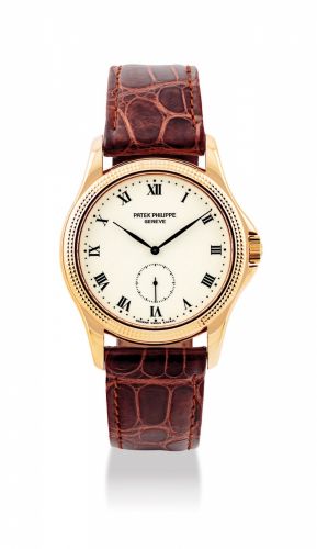 PATEK PHILIPPE. A FINE 18K GOLD WRISTWATCH WITH ENAMEL DIAL