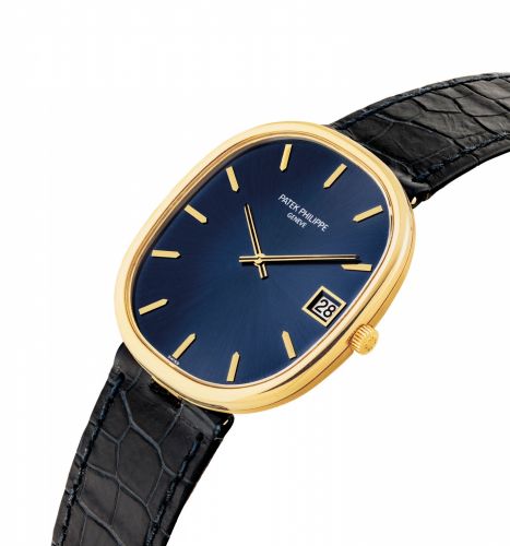PATEK PHILIPPE. A FINE 18K GOLD AUTOMATIC OVAL WRISTWATCH WITH DATE