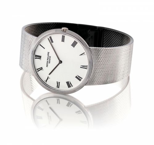 PATEK PHILIPPE. A FINE 18K WHITE GOLD AUTOMATIC BRACELET WATCH