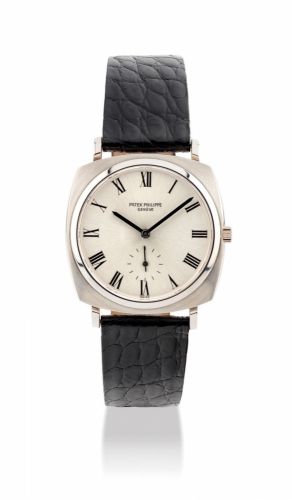 PATEK PHILIPPE. A FINE AND RARE 18K WHITE GOLD CUSHION-SHAPED AUTOMATIC WRISTWATCH