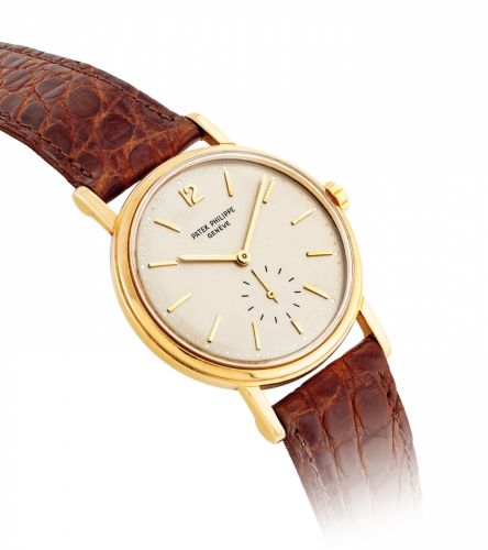 PATEK PHILIPPE. AN 18K GOLD AUTOMATIC WRISTWATCH