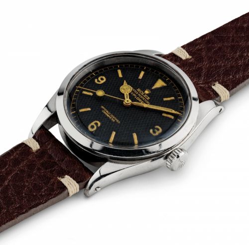 ROLEX. A FINE AND RARE STAINLESS STEEL AUTOMATIC WRISTWATCH WITH SWEEP CENTRE SECONDS AND HONEYCOMB DIAL