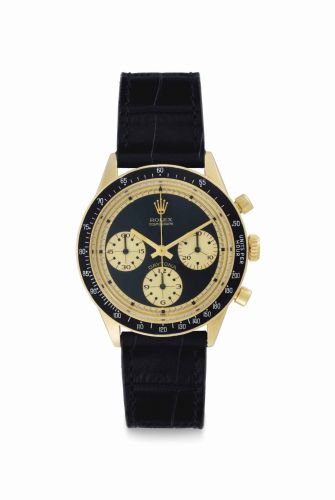Rolex. An Extremely Fine and Very Rare 14k Gold Chronograph Wristwatch with Black “John Player Special Paul Newman'' Dial