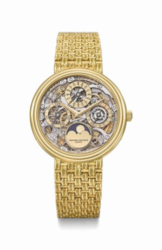 Vacheron Constantin. A very fine and rare 18K gold automatic perpetual calendar skeletonized wristwatch with moon phases and integral 18K gold bracelet, original certificate and box