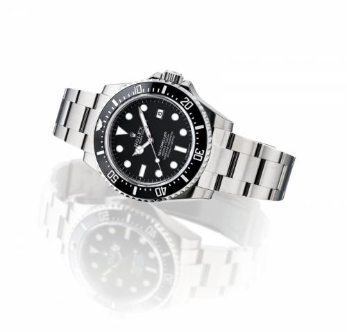 ROLEX. A STAINLESS STEEL AUTOMATIC WRISTWATCH WITH SWEEP/bb /bbCENTRE SECONDS, DATE, HELIUM ESCAPE VALVE AND BRACELET/bb