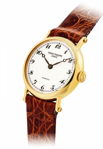 PATEK PHILIPPE. A LADY'S FINE AND RARE 18K GOLD WRISTWATCH WITH BREGUET NUMERALS