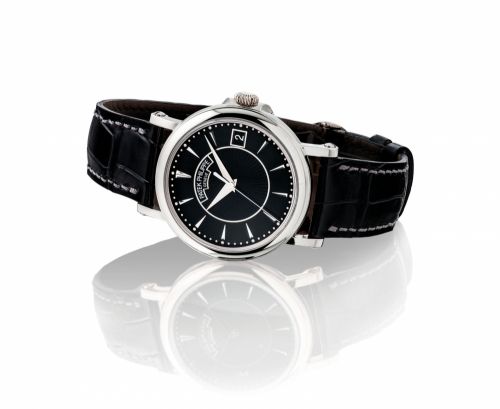 PATEK PHILIPPE. A FINE 18K WHITE GOLD AUTOMATIC WRISTWATCH WITH SWEEP CENTRE SECONDS AND DATE