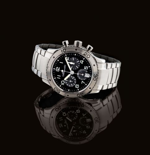 BREGUET. A FINE STAINLESS STEEL AUTOMATIC FLYBACK CHRONOGRAPH WRISTWATCH WITH DATE AND BRACELET