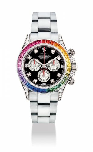 ROLEX. A VERY RARE AND IMPRESSIVE 18K WHITE GOLD AND DIAMOND-SET AUTOMATIC CHRONOGRAPH WRISTWATCH WITH RAINBOW-COLOURED MULTI-GEM SET BEZEL AND BRACELET