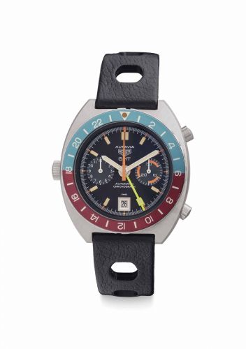 Heuer. A Fine Stainless Steel Automatic Dual Time Chronograph Wristwatch with Date and Bracelet