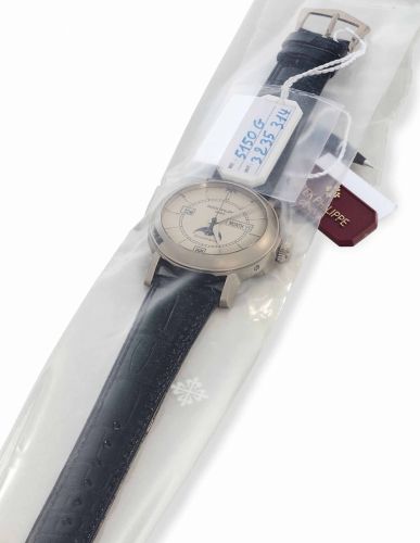 Patek Philippe. A Very Rare 18k White Gold Limited Edition Automatic Annual Calendar Wristwatch with Moon Phases and Center Seconds