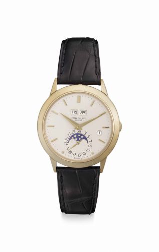 Patek Philippe. A Very Fine and Rare 18k Gold Automatic Perpetual Calendar Wristwatch With Moon Phases and Leap Year Indication