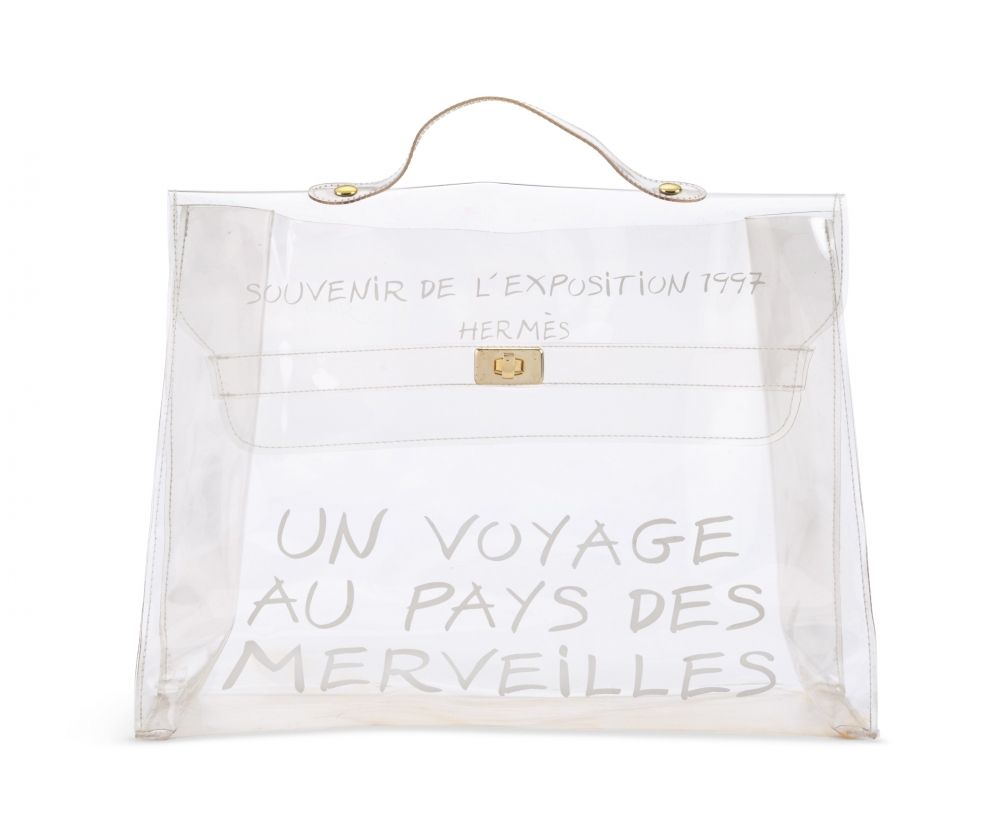 A CLEAR VINYL SOUVENIR DE L'EXPOSITION KELLY WITH GOLD HARDWARE HERMÈS, 1997