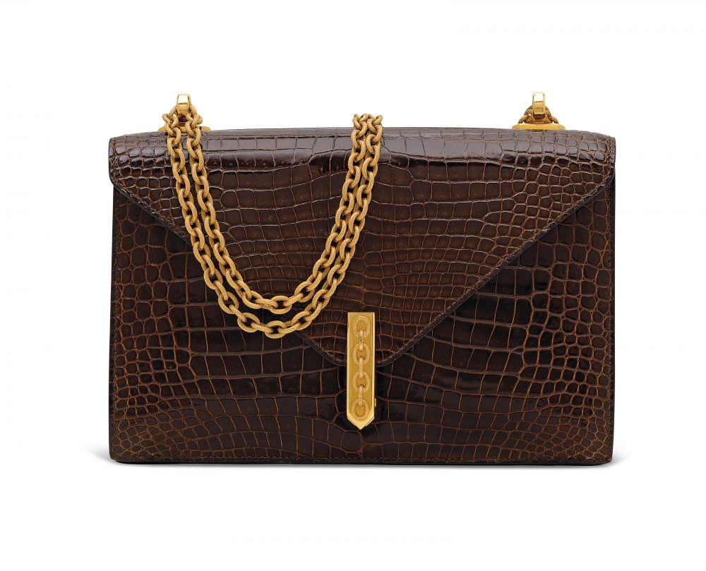 A SHINY MIEL POROSUS CROCODILE ALCAZAR WITH GOLD HARDWARE