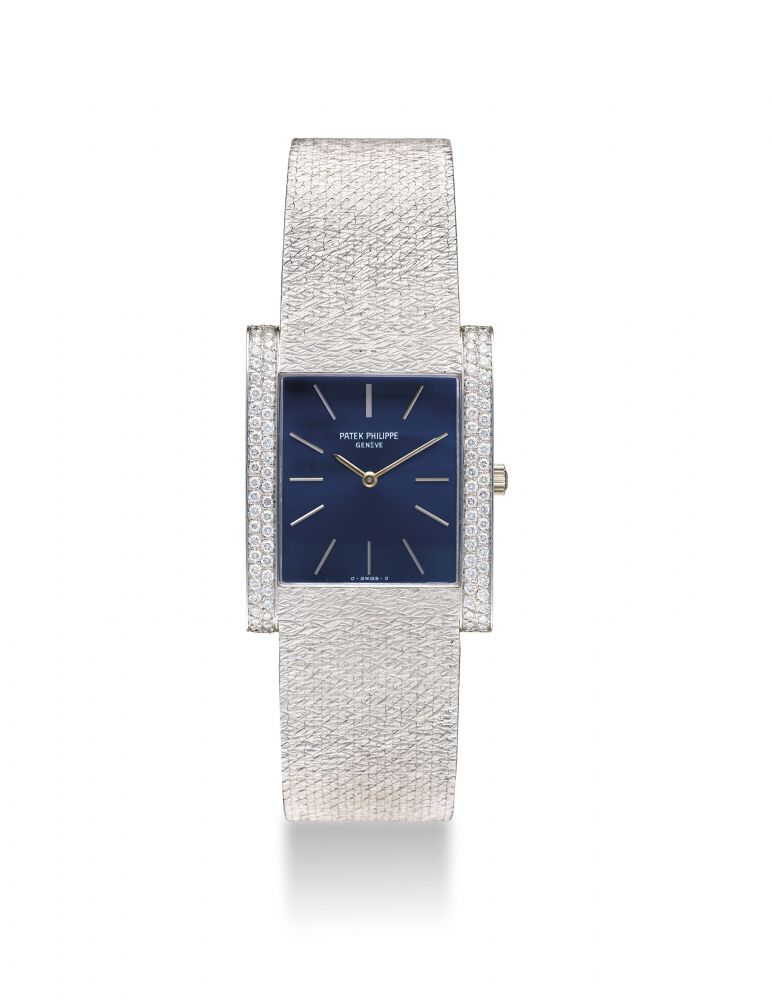 PATEK PHILLIPE. AN ATTRACTIVE AND RARE 18K WHITE GOLD DIAMOND-SET RECTANGULAR WRISTWATCH WITH BRACELET