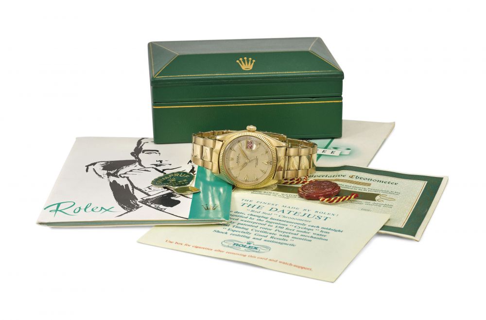 ROLEX. A RARE 18K GOLD AUTOMATIC WRISTWATCH WITH SWEEP CENTRE SECONDS, ALTERNATE RED AND BLACK DATE, BRACELET, BLANK GUARANTEE AND BOX