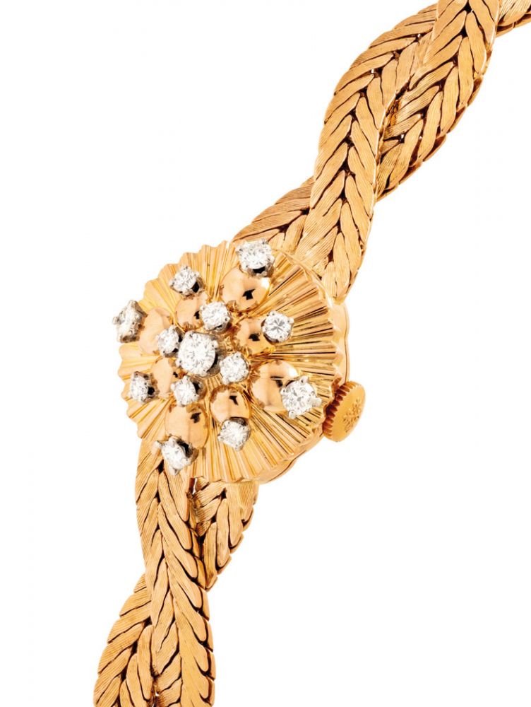 PATEK PHILIPPE. A LADY'S FINE 18K PINK GOLD AND DIAMOND-SET BRACELET WATCH WITH CONCEALED DIAL