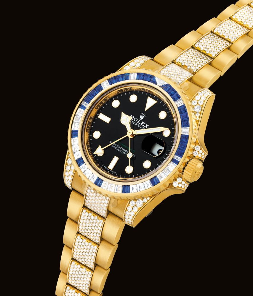 ROLEX. A FINE AND VERY RARE 18K GOLD, DIAMOND AND SAPPHIRE-SET AUTOMATIC DUAL TIME WRISTWATCH WITH SWEEP CENTRE SECONDS, DATE AND BRACELET