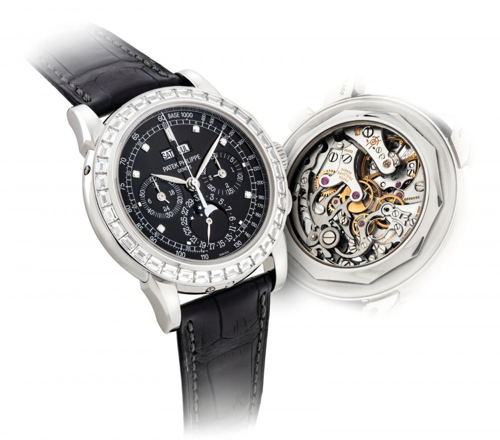 PATEK PHILIPPE. A VERY FINE AND RARE PLATINUM AND DIAMOND-SET PERPETUAL CALENDAR CHRONOGRAPH WRISTWATCH WITH MOON PHASES, 24-HOUR AND LEAP YEAR INDICATION