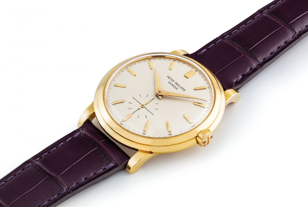 PATEK PHILIPPE. A FINE 18K GOLD AUTOMATIC WRISTWATCH