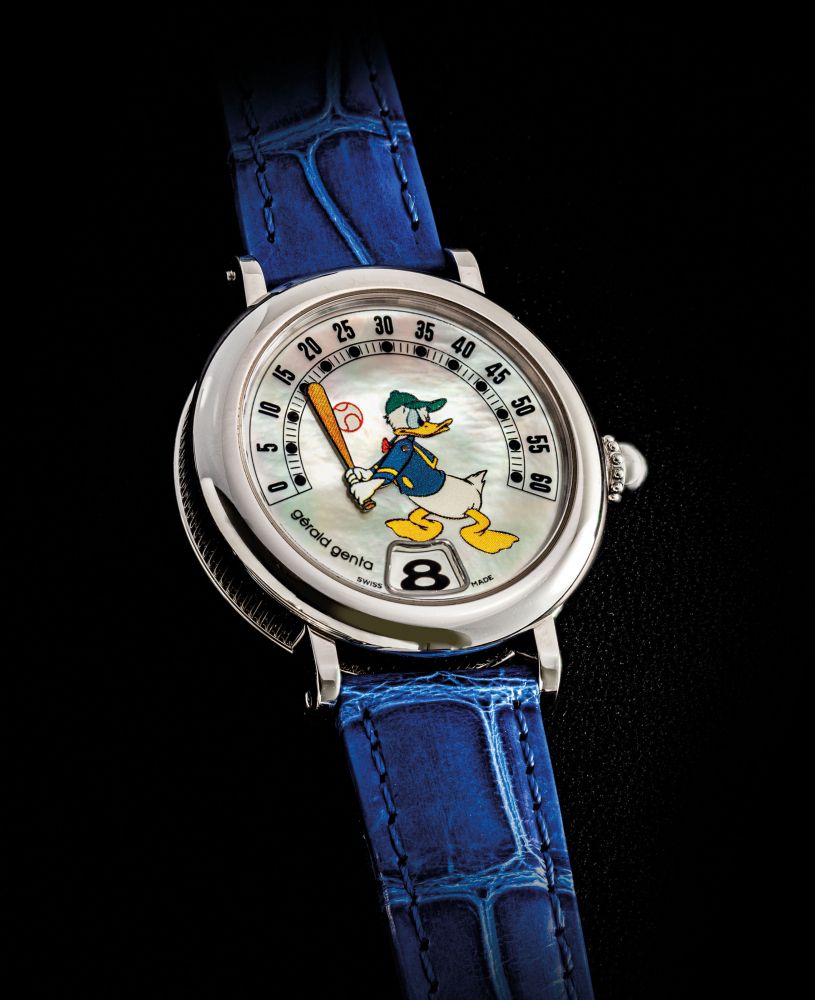 GERALD GENTA. A STAINLESS STEEL AUTOMATIC JUMP HOUR WRISTWATCH WITH RETROGRADE MINUTES AND MOTHER-OF-PEARL DIAL