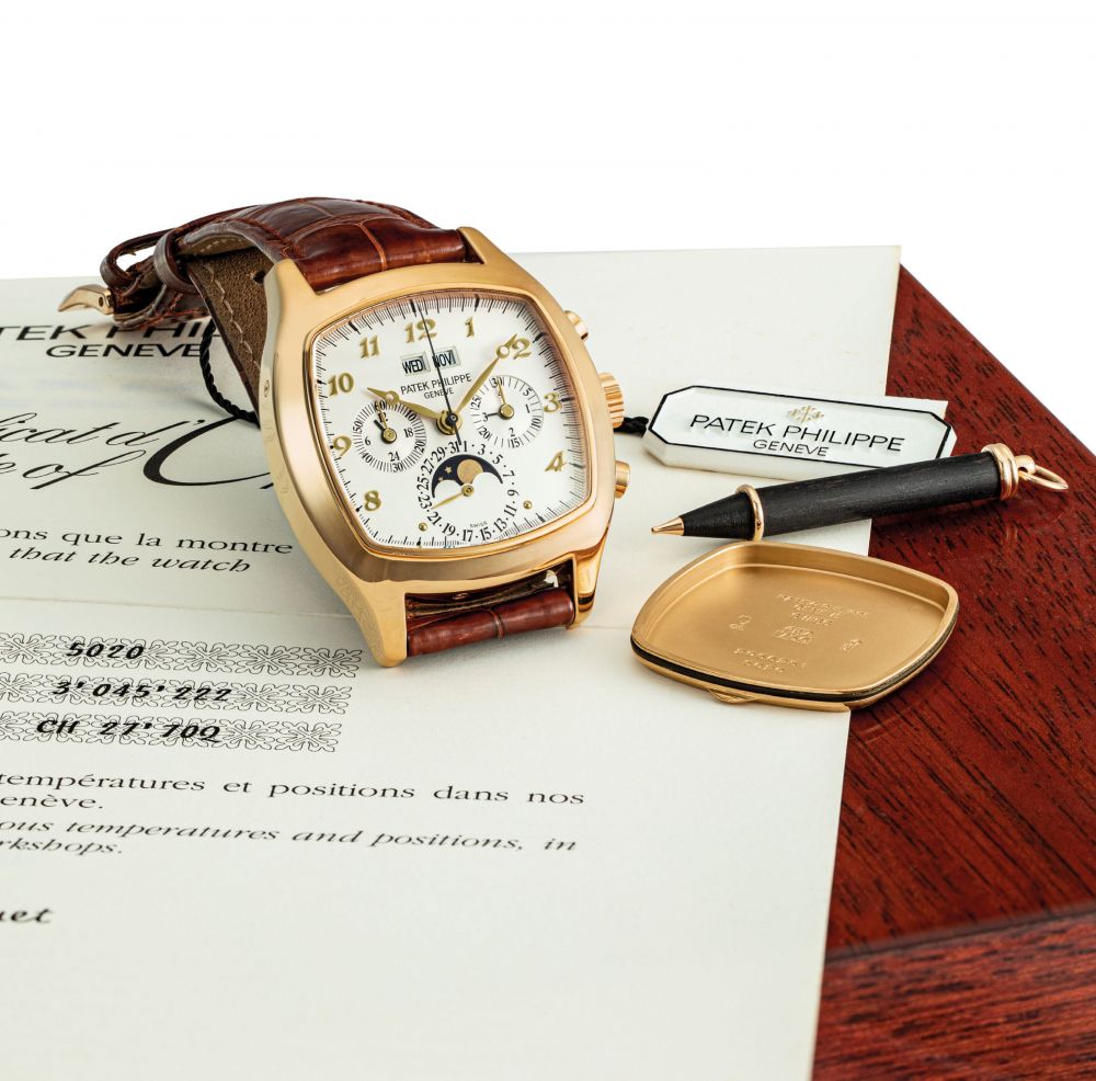 PATEK PHILIPPE. A VERY FINE AND RARE 18K PINK GOLD CUSHION-SHAPED PERPETUAL CALENDAR CHRONOGRAPH WRISTWATCH WITH MOON PHASES, 24 HOUR AND LEAP YEAR INDICATION