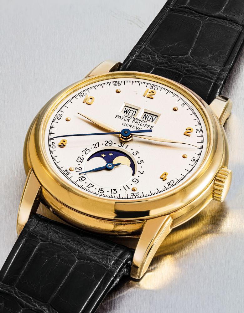 PATEK PHILIPPE. AN EXTREMELY FINE AND IMPORTANT, PROBABLY UNIQUE 18K GOLD PERPETUAL CALENDAR WRISTWATCH WITH MOON PHASES AND SWEEP CENTER SECONDS