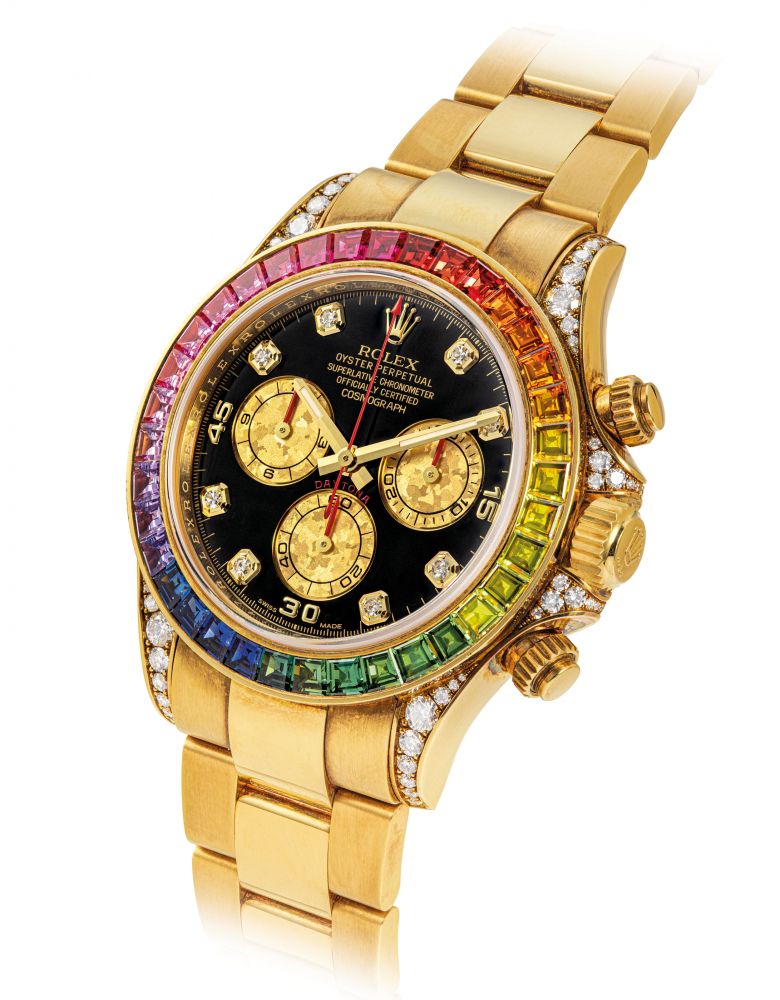 ROLEX. A VERY RARE AND IMPRESSIVE 18K GOLD AND DIAMOND-SET AUTOMATIC CHRONOGRAPH WRISTWATCH WITH RAINBOW-COLOURED MULTI-GEM SET BEZEL AND BRACELET