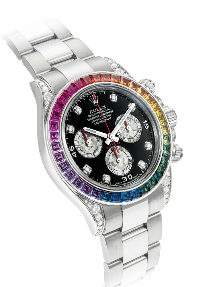 ROLEX. A VERY RARE AND IMPRESSIVE 18K WHITE GOLD AND DIAMOND-SET AUTOMATIC CHRONOGRAPH WRISTWATCH WITH RAINBOW-COLOURED MULTI-GEM SET BEZEL AND BRACELET