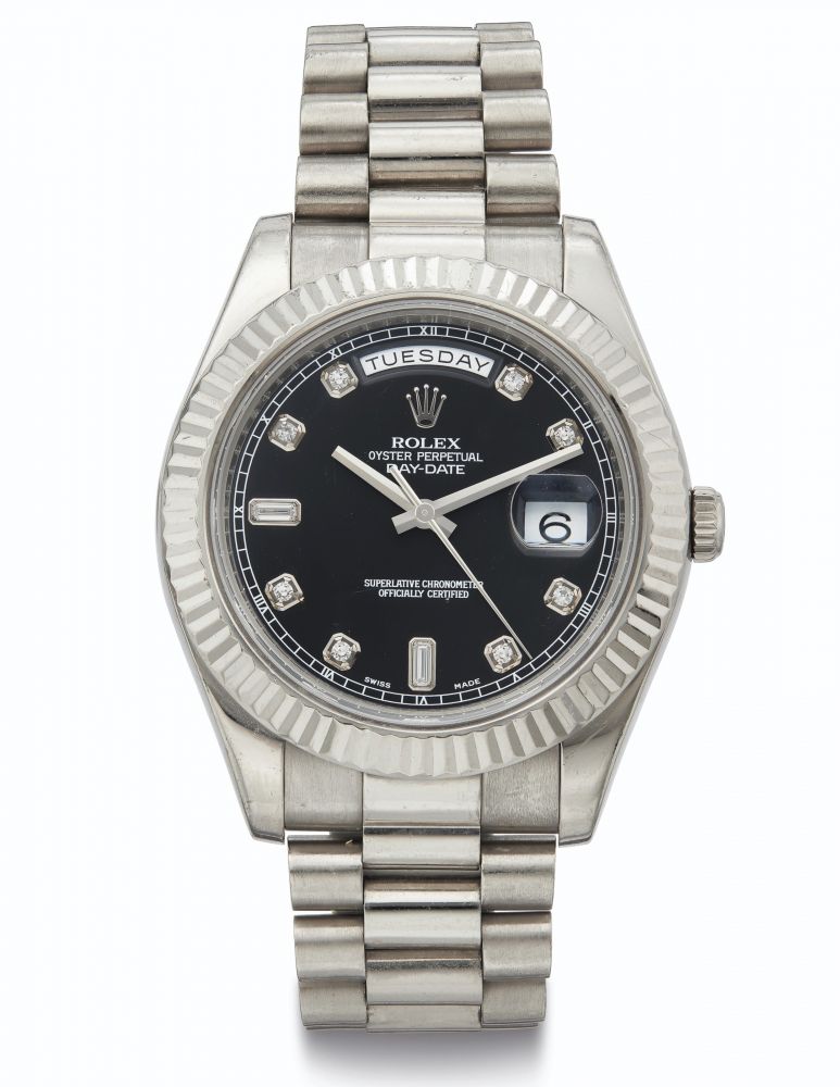 Rolex. A Fine 18k White Gold and Diamond-set Wristwatch with Day, Date, Center Seconds and Bracelet