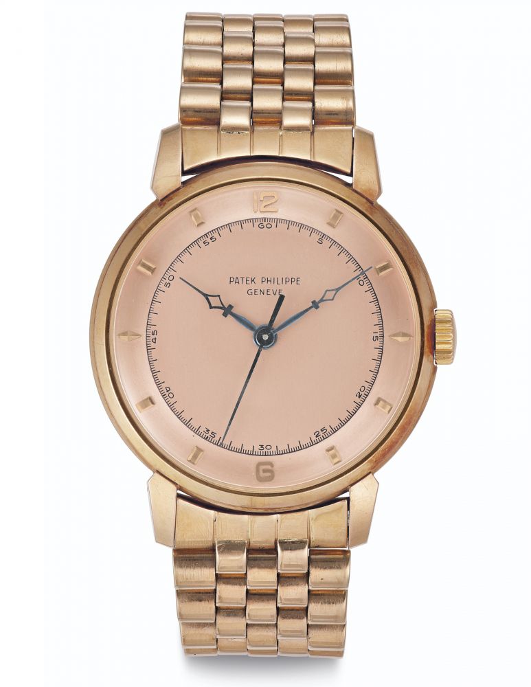 Patek Philippe. A Very Fine and Rare 18k Pink Gold Wristwatch with Pink Dial, Center Seconds and Bracelet