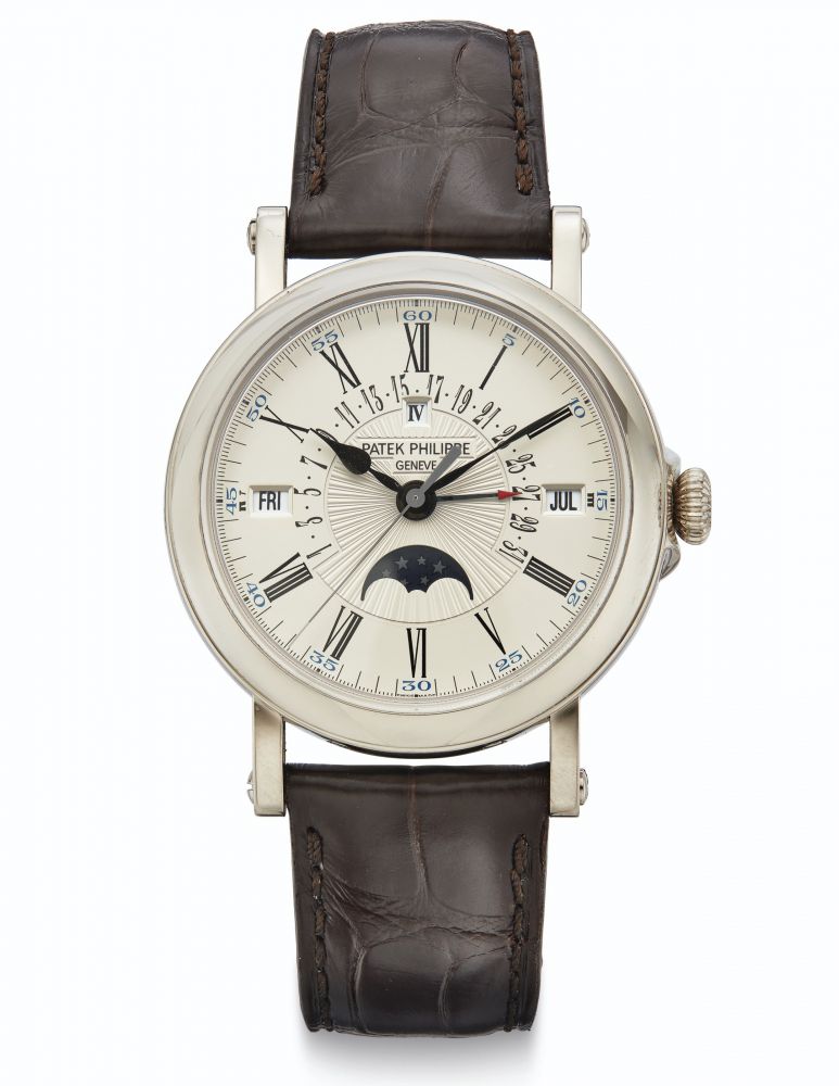 Patek Philippe. A Fine 18k White Gold Automatic Perpetual Calendar Wristwatch with Leap Year Indication, Retrograde Date, Center Seconds and Moon Phases