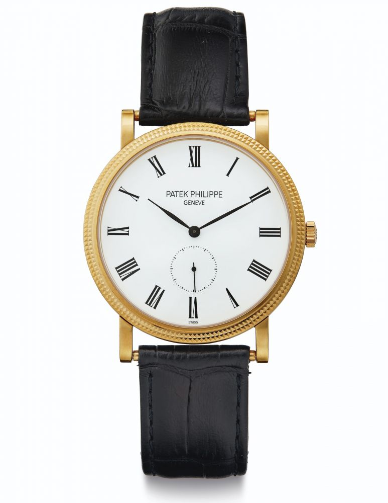 Patek Philippe. An 18k Gold Wristwatch with Hobnail bezel