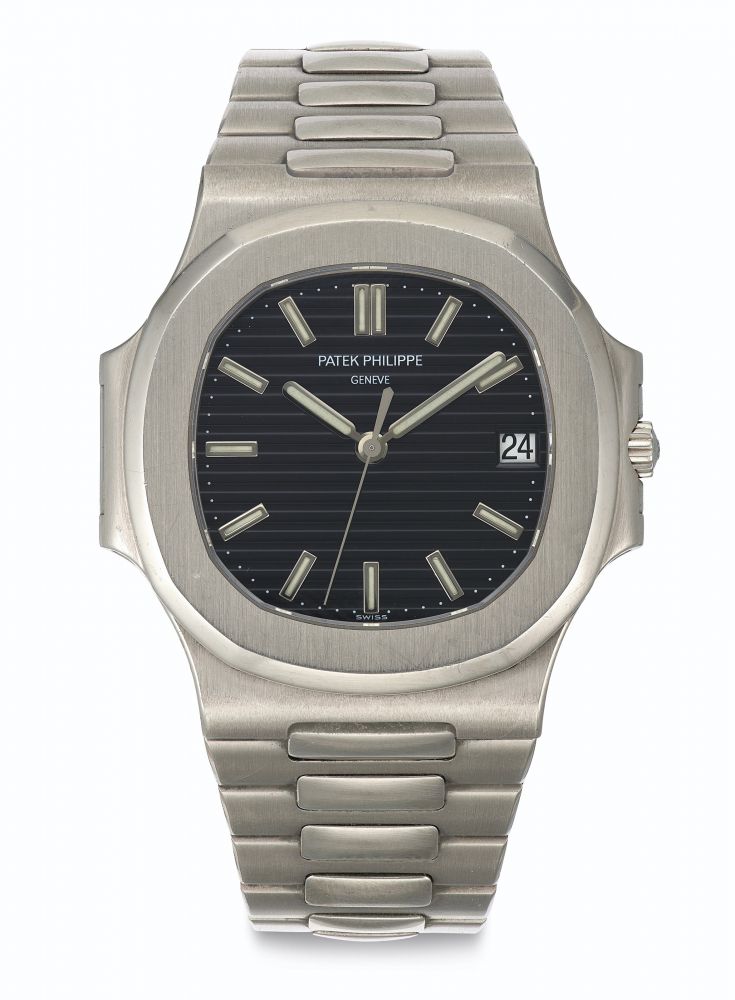Patek Philippe. A Rare and Attractive 18k White Gold Automatic Wristwatch with Date, Center Seconds and Bracelet