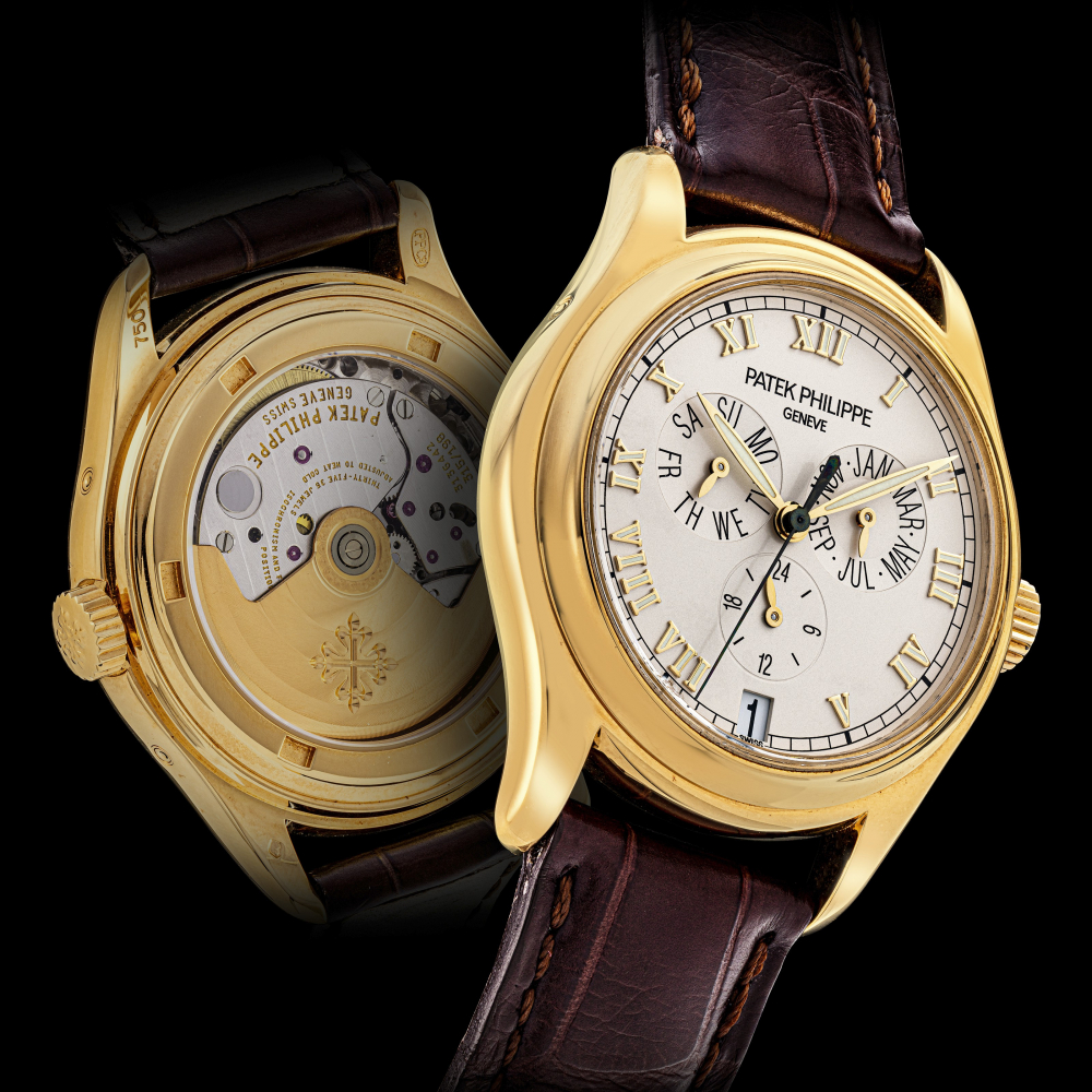 PATEK PHILIPPE, GOLD WITH ANNUAL CALENDAR AND 24-HOUR INDICATION, REF. 5035 -