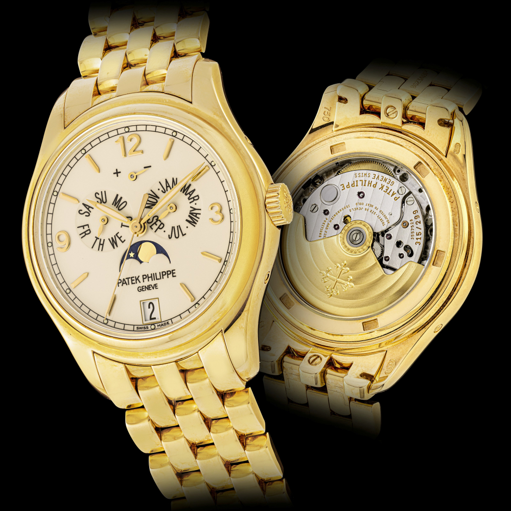 PATEK PHILIPPE, GOLD WITH POWER RESERVE, ANNUAL CALENDAR AND MOONPHASES, REF.5146/1J-001 -