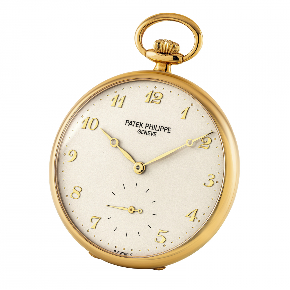 PATEK PHILIPPE, GOLD WITH BREGUET NUMERALS, REF. 973 -